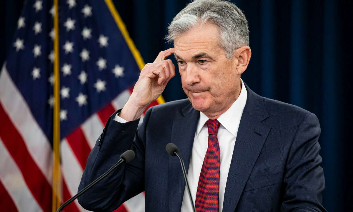 Dow Falls as Nasdaq Posts New Record High on Fed Statement